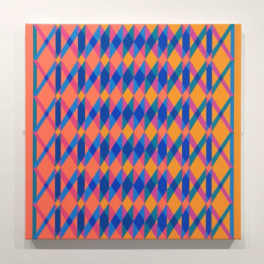 Abstract geometric painting in yellow and orange on a white wall