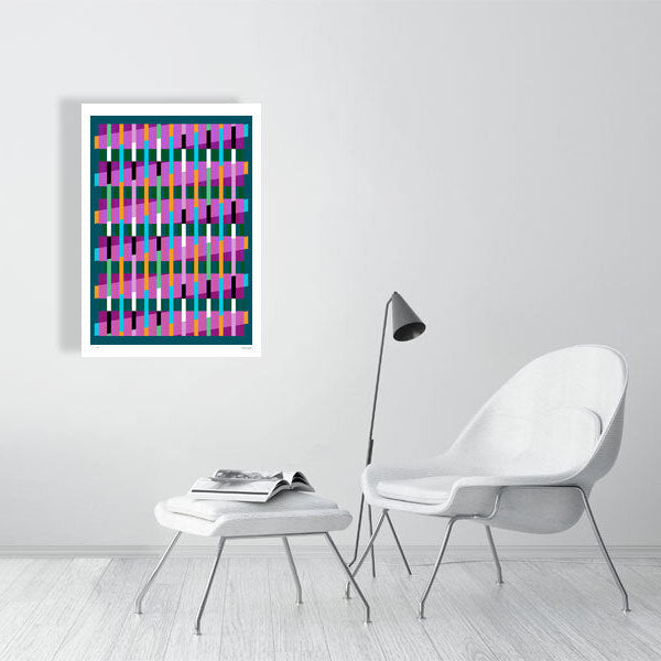 Modern interior featuring a vibrant Lux Series abstract print by Victoria Mardon, displayed on a white wall with minimalist white furniture.