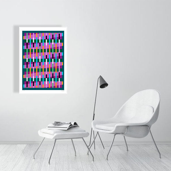 Modern interior featuring a vibrant Lux Series abstract print by Victoria Mardon, displayed on a white wall with minimalist white furniture.
