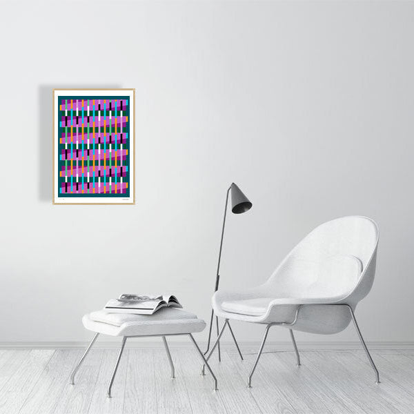 Modern interior featuring a vibrant Lux Series abstract print by Victoria Mardon, displayed on a white wall with minimalist white furniture.