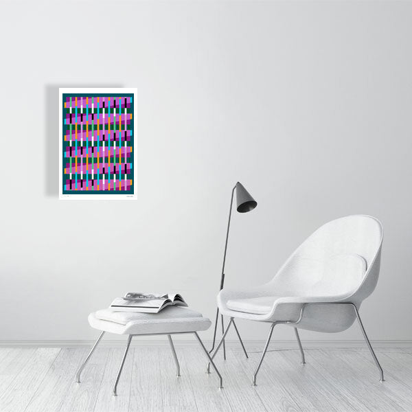 Modern interior featuring a vibrant Lux Series abstract print by Victoria Mardon, displayed on a white wall with minimalist white furniture.
