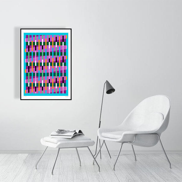 Modern interior featuring a vibrant Lux Series abstract print by Victoria Mardon, displayed on a white wall with minimalist white furniture.