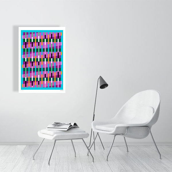Modern interior featuring a vibrant Lux Series abstract print by Victoria Mardon, displayed on a white wall with minimalist white furniture.