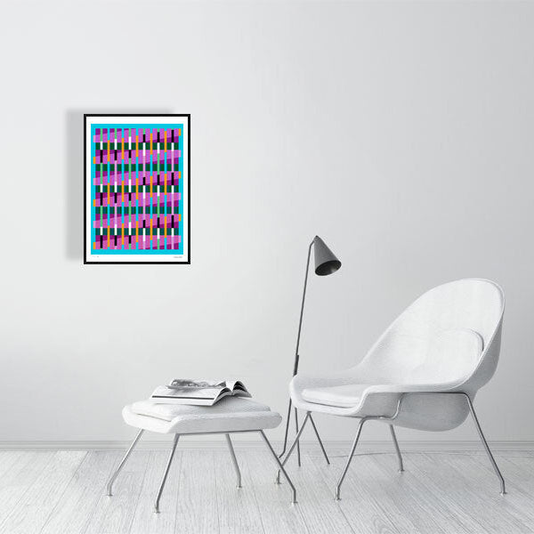 Modern interior featuring a vibrant Lux Series abstract print by Victoria Mardon, displayed on a white wall with minimalist white furniture.