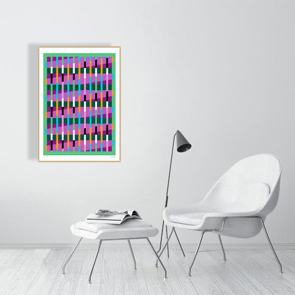 Modern interior featuring a vibrant Lux Series abstract print by Victoria Mardon, displayed on a white wall with minimalist white furniture.