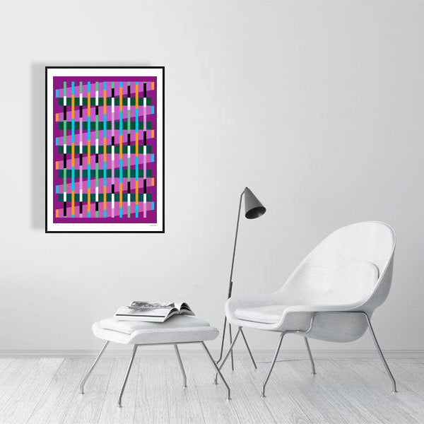 Modern interior featuring a vibrant Lux Series abstract print by Victoria Mardon, displayed on a white wall with minimalist white furniture.
