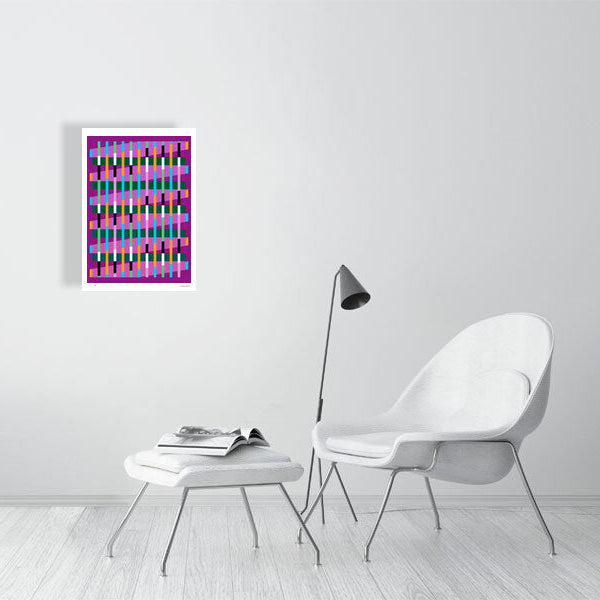 Modern interior featuring a vibrant Lux Series abstract print by Victoria Mardon, displayed on a white wall with minimalist white furniture.