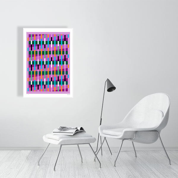 Modern interior featuring a vibrant Lux Series abstract print by Victoria Mardon, displayed on a white wall with minimalist white furniture.