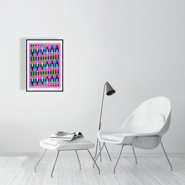 Modern interior featuring a vibrant Lux Series abstract print by Victoria Mardon, displayed on a white wall with minimalist white furniture.