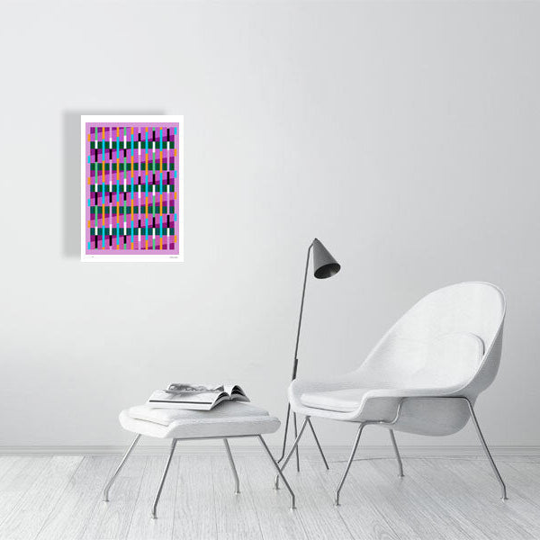 Modern interior featuring a vibrant Lux Series abstract print by Victoria Mardon, displayed on a white wall with minimalist white furniture.