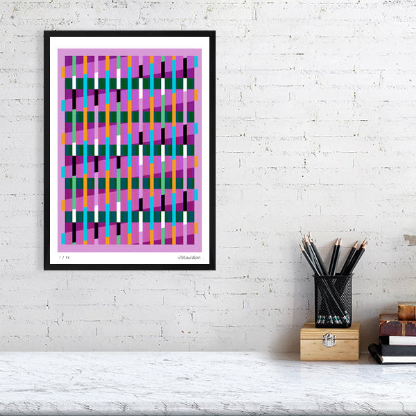 Colourful Lux Series abstract print by Victoria Mardon on a white brick wall, styled with creative studio supplies below