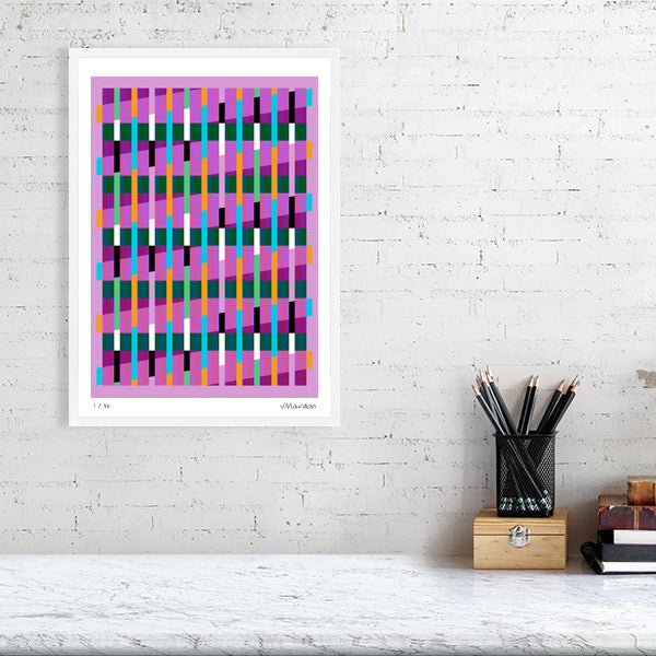 Colourful Lux Series abstract print by Victoria Mardon on a white brick wall, styled with creative studio supplies below