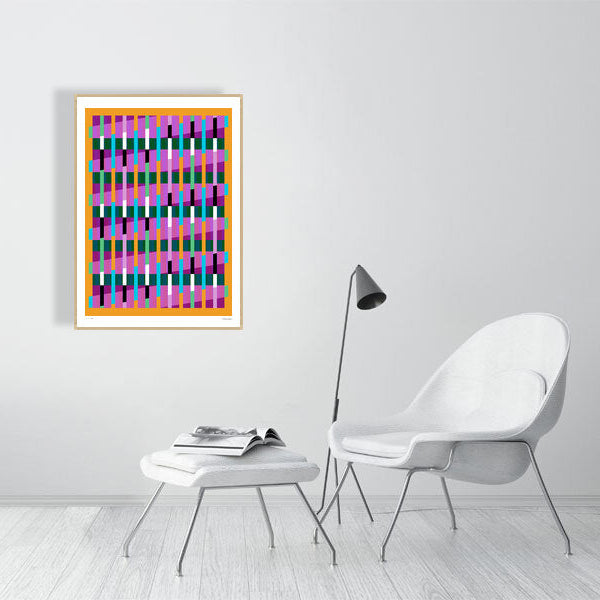 Modern interior featuring a vibrant Lux Series abstract print by Victoria Mardon, displayed on a white wall with minimalist white furniture.