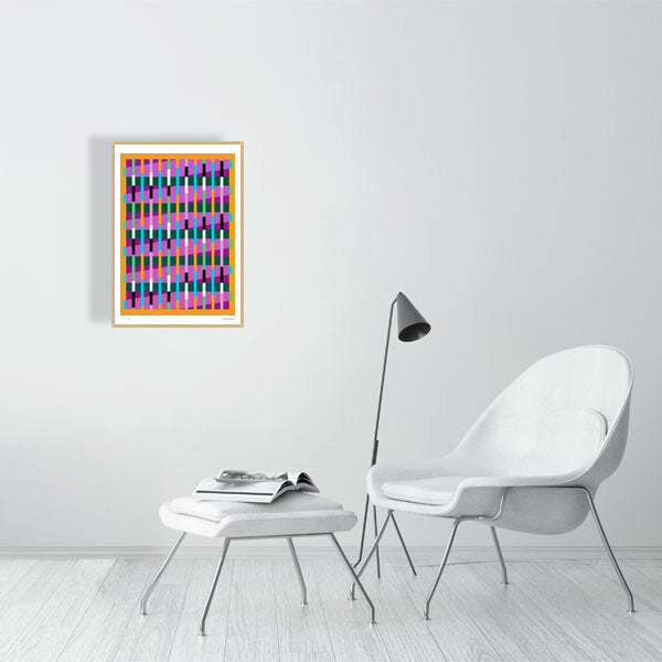 Modern interior featuring a vibrant Lux Series abstract print by Victoria Mardon, displayed on a white wall with minimalist white furniture.
