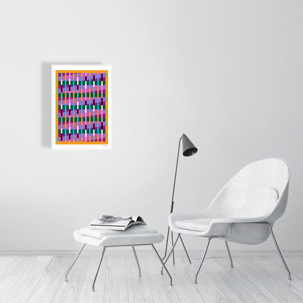 Modern interior featuring a vibrant Lux Series abstract print by Victoria Mardon, displayed on a white wall with minimalist white furniture.