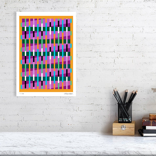 Colourful Lux Series abstract print by Victoria Mardon on a white brick wall, styled with creative studio supplies below.
