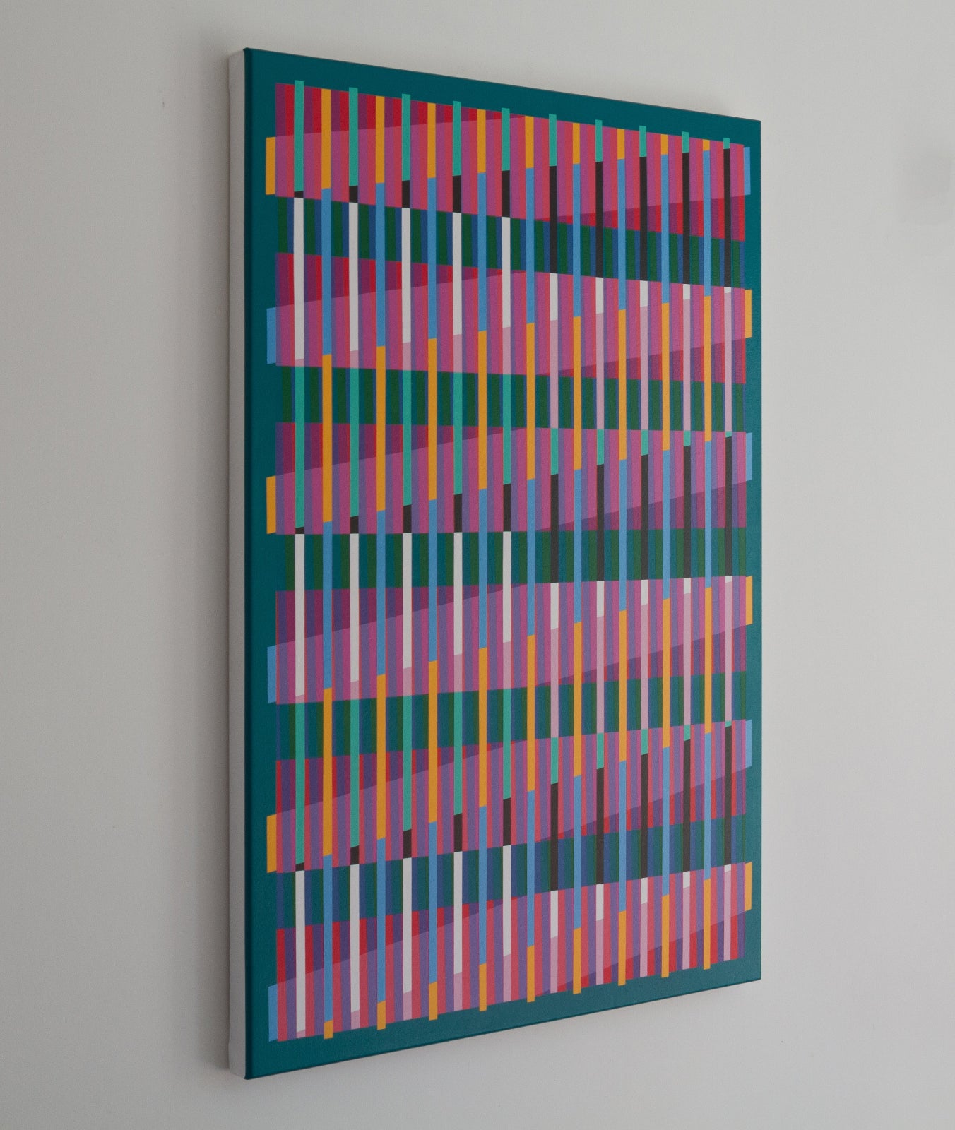 Left side view of “Lux Turquoise” – abstract painting with a colourful geometric pattern on a turquoise background.