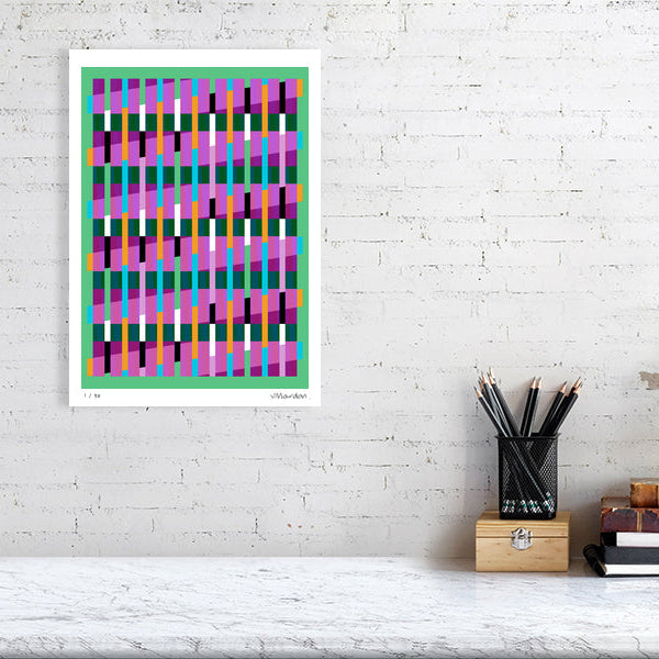Colourful Lux Series abstract print by Victoria Mardon on a white brick wall, styled with creative studio supplies below.