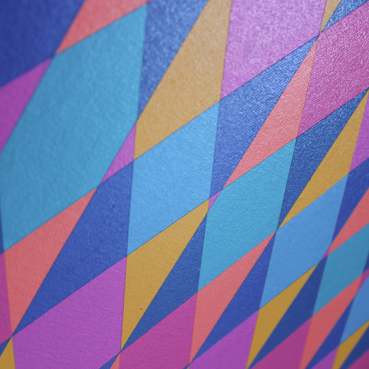 Close-up of “Gateways to Now” (Pink) – abstract painting with a colourful geometric pattern and diagonal stripes on a rich blue background. 