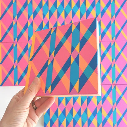 “I PV19 PR122” – one module from Victoria Mardon’s B.E.L.O.N.G.I.N.G series held in front of the full artwork. Colourful geometric pattern on canvas, shown in context.