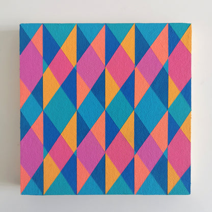 “N1 PG7/PB15:3 – PB15:3/PG7” – small abstract canvas painting with a geometric pattern in blue, pink and orange on a white background. Part of the B.E.L.O.N.G.I.N.G modular series by Victoria Mardon.