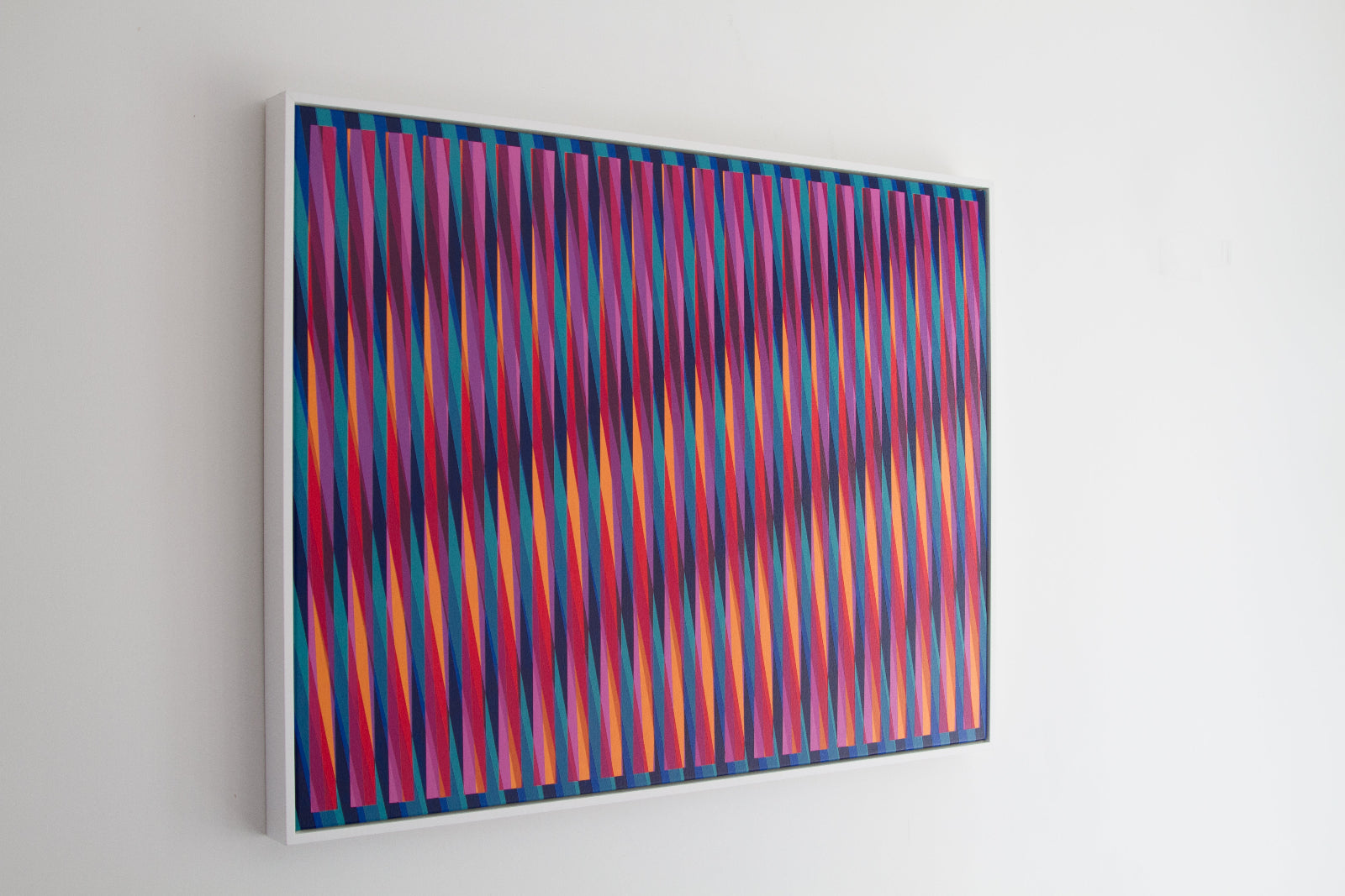 Side view of “Summer Daze” – colourful abstract artwork with vibrant stripes on a blue background, viewed from the left.
