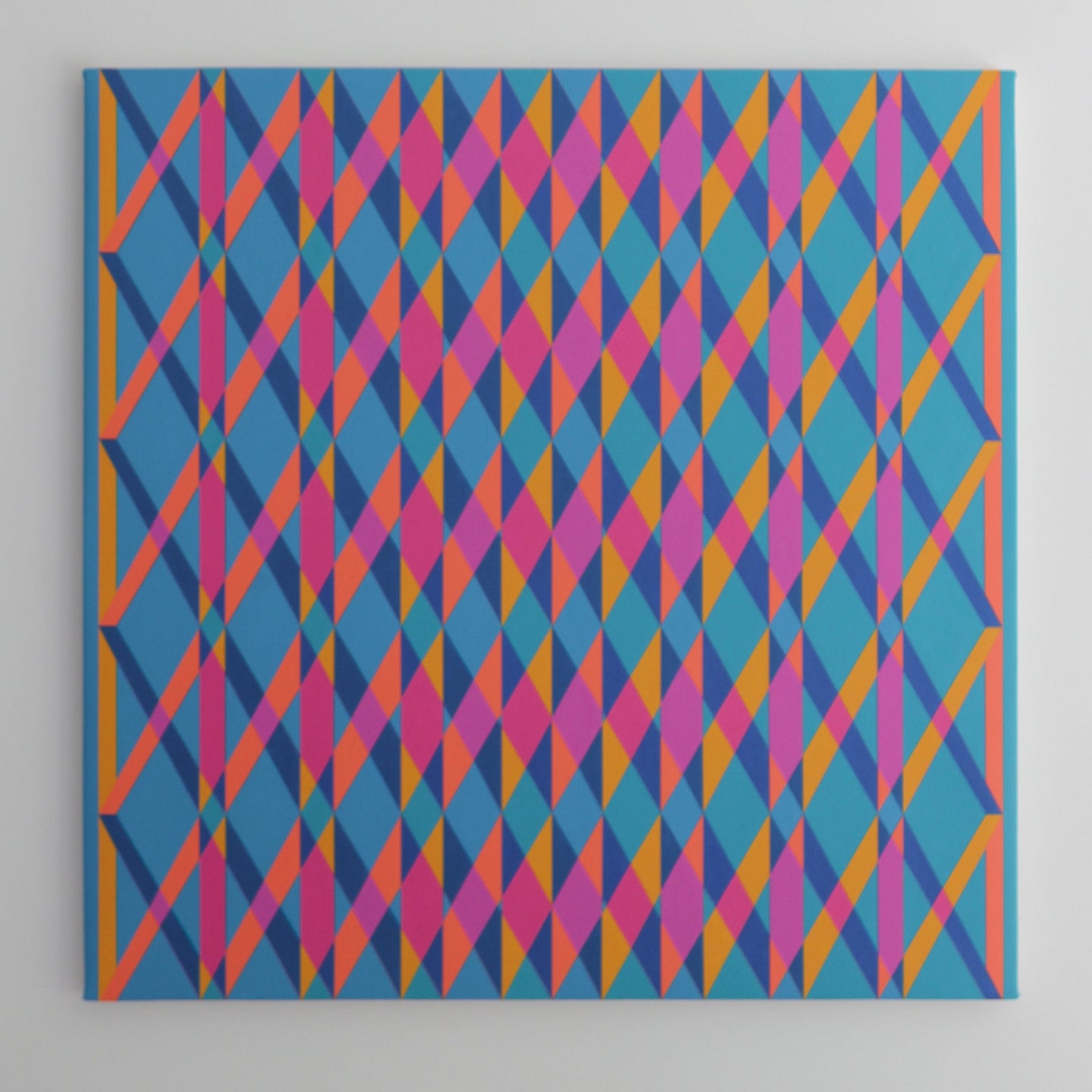"Gateways to Now (Blue)" — geometric metamorphosing pattern in blue, pink, and orange on a blue background.