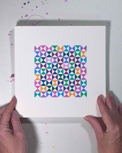 Hands holding a bold, graphic multicoloured abstract painting with repeating geometric shapes, 8 August – 039/365 (46242/365) by Victoria Mardon, 365: A Year in Colour series.