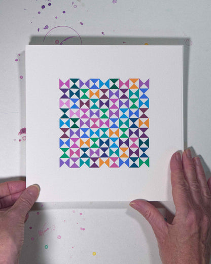 Hands holding a bold, graphic multicoloured abstract painting with repeating geometric shapes, 15 August – 046/365 (46249/365) by Victoria Mardon, 365: A Year in Colour series.