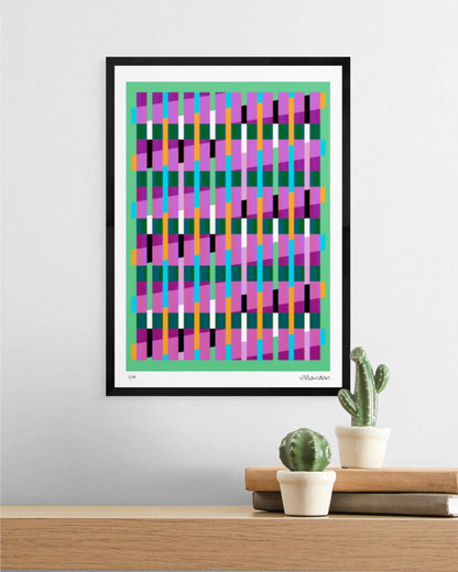 A3 black-framed geometric abstract giclée print by Victoria Mardon displayed on a white wall above an oak shelf