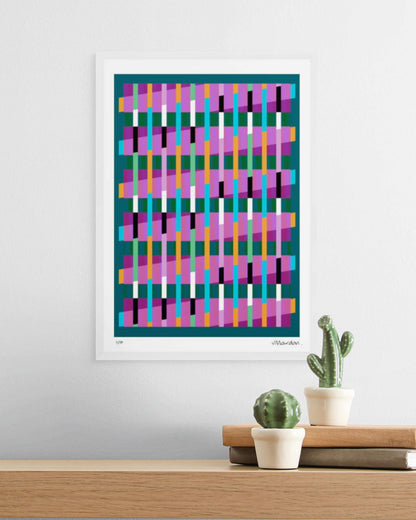 A3 white-framed geometric abstract giclée print by Victoria Mardon displayed on a white wall above an oak shelf