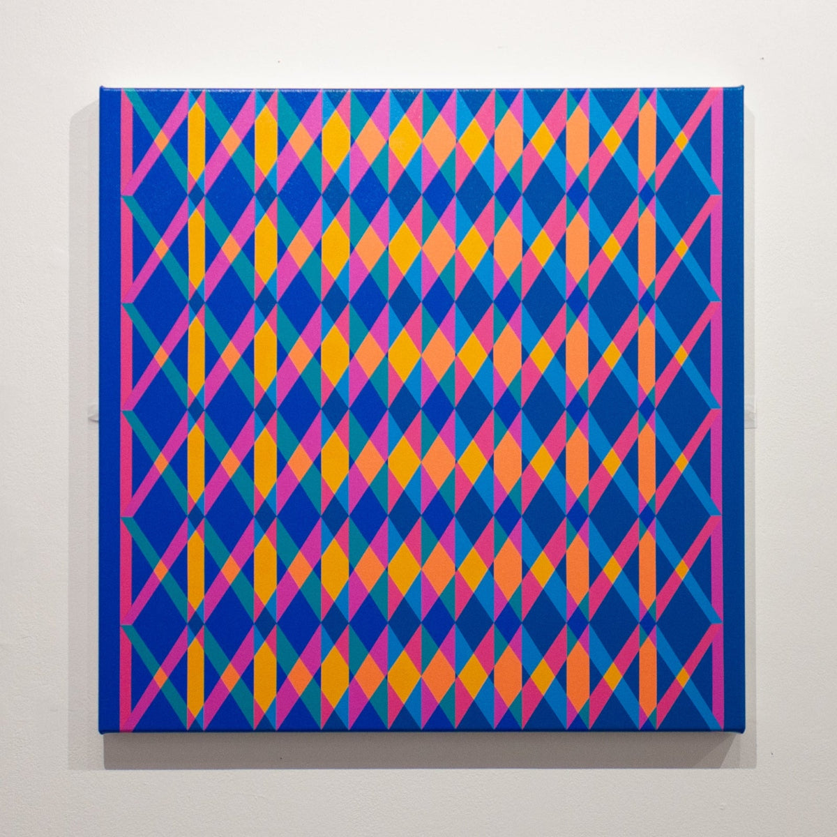 Colorful geometric pattern on a white wall