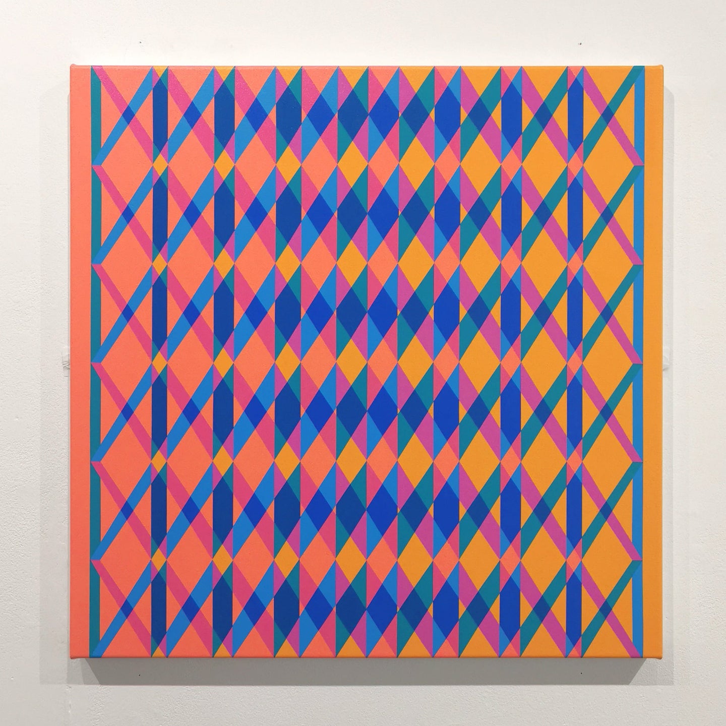 Colorful geometric pattern on a white wall